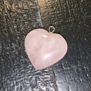 Rose quartz heart shaped pendant.